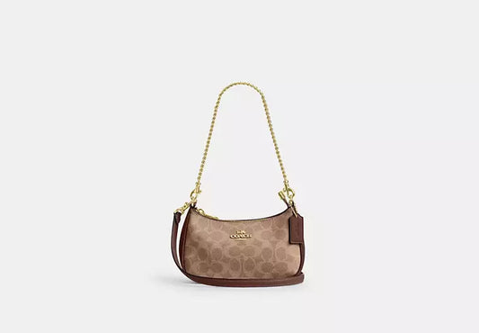 Teri Mini Crossbody Bag In Signature Canvas